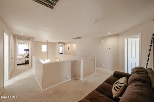 a view of a street with a building in the background