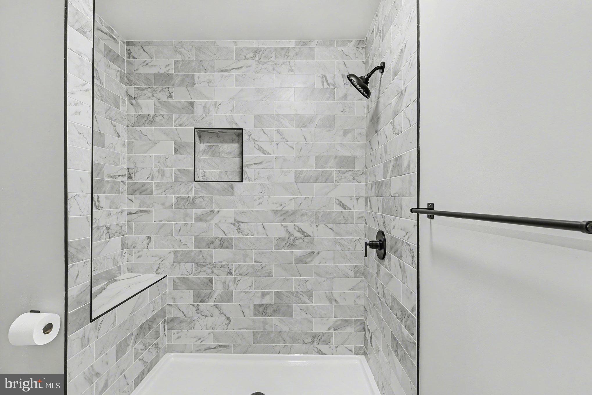 2 Winners Circle, Unit 1B Owings Mills, MD 21117 - Photo 22 of 39 a bathroom with a shower