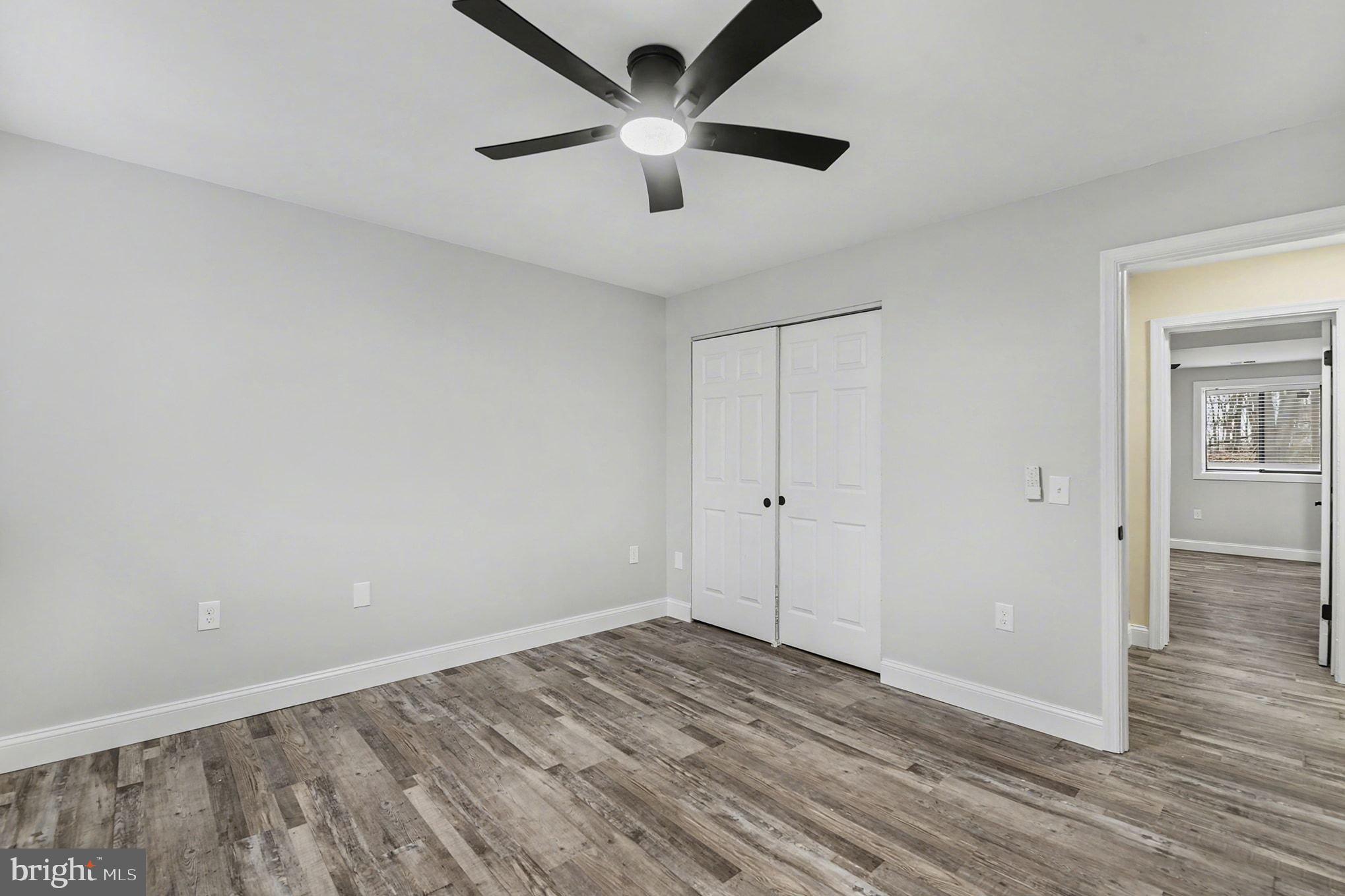 2 Winners Circle, Unit 1B Owings Mills, MD 21117 - Photo 24 of 39 wooden floor in an empty room
