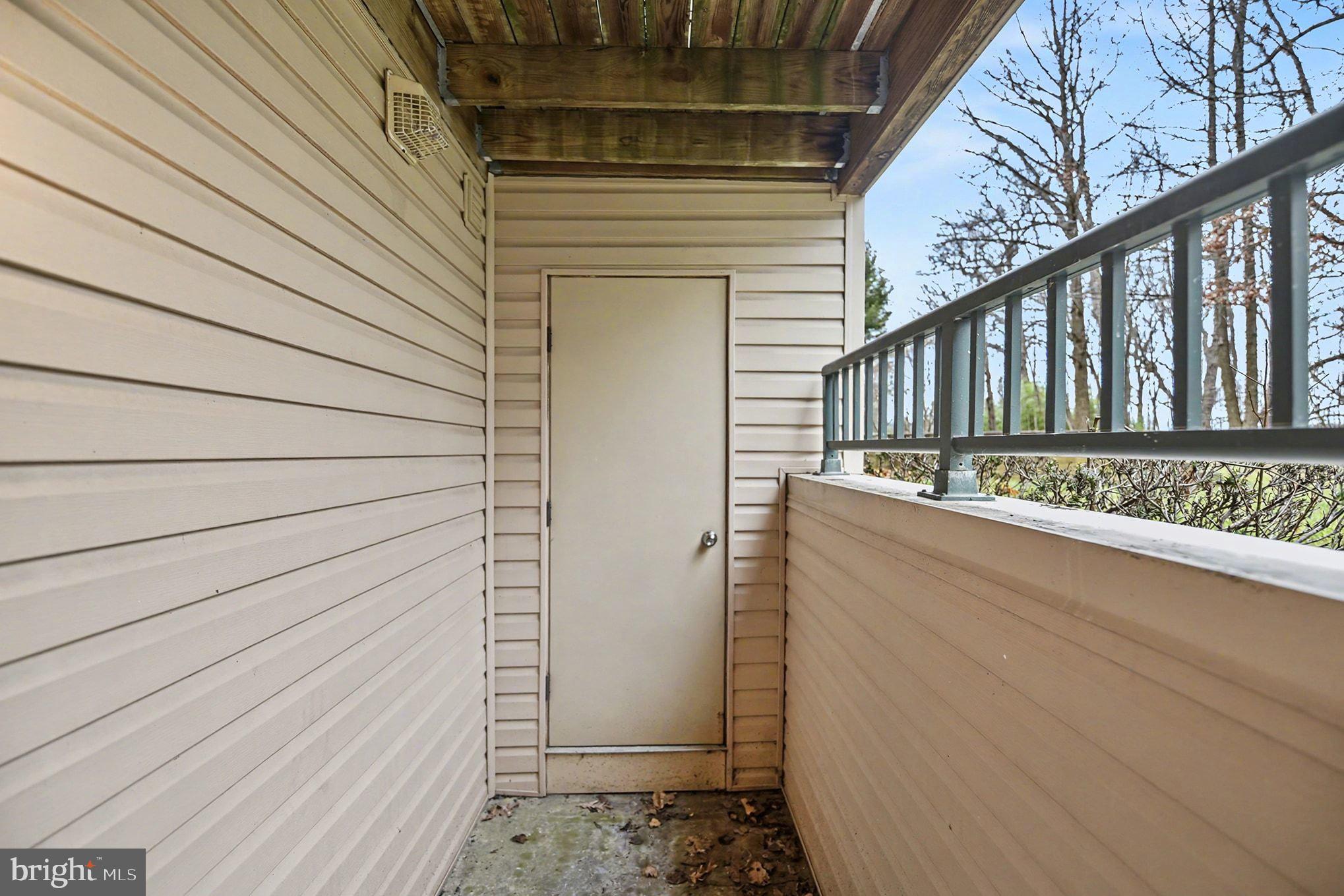 2 Winners Circle, Unit 1B Owings Mills, MD 21117 - Photo 32 of 39 a view of wooden balcony