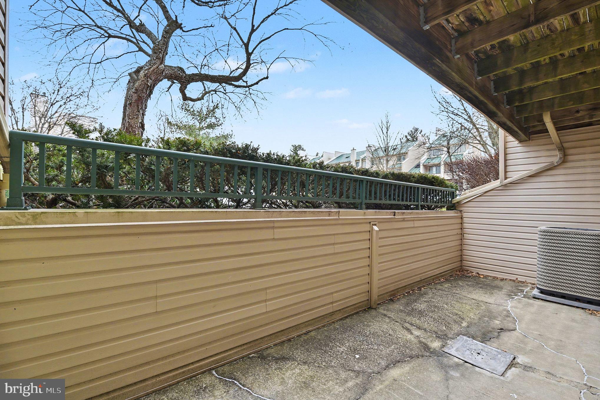 2 Winners Circle, Unit 1B Owings Mills, MD 21117 - Photo 33 of 39 a view of a terrace with sky view