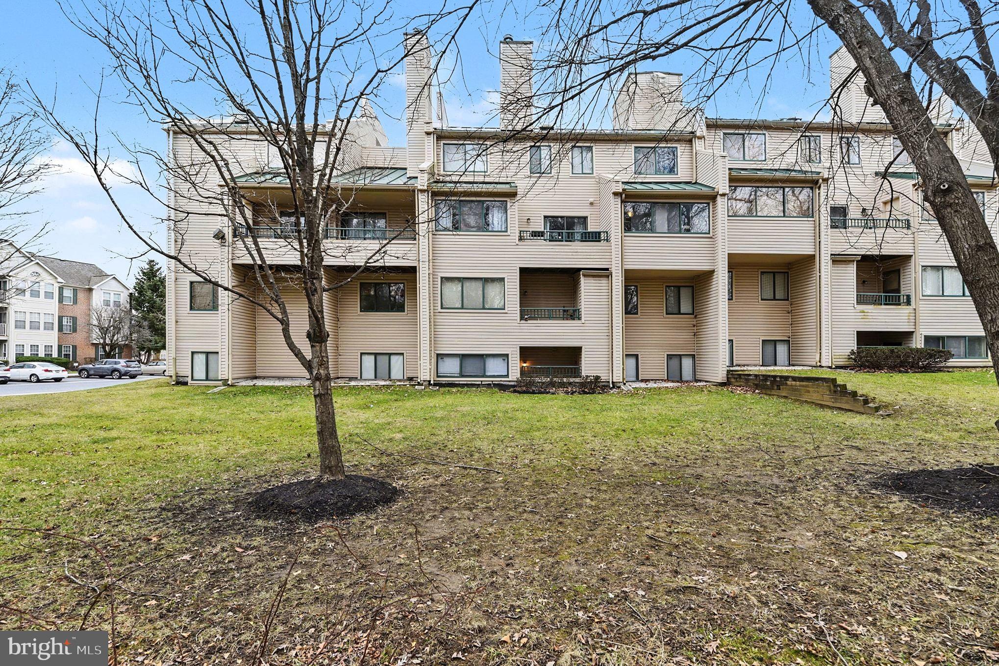 2 Winners Circle, Unit 1B Owings Mills, MD 21117 - Photo 34 of 39 a view of a big house with a street