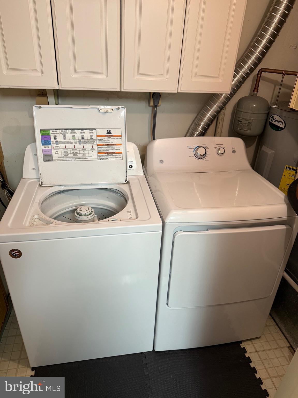 2 Winners Circle, Unit 1B Owings Mills, MD 21117 - Photo 9 of 39 a utility room with dryer and washer