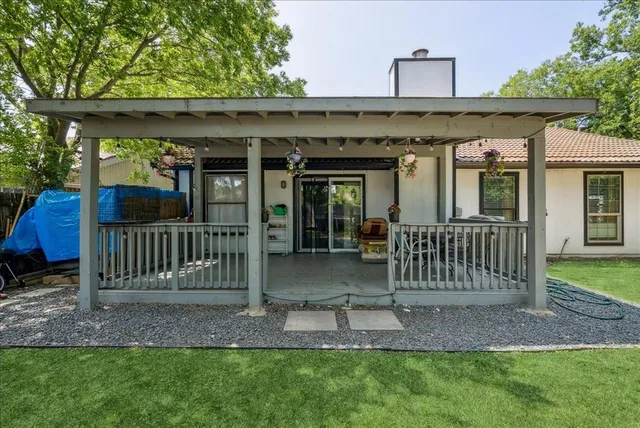 a deck view with a seating space and garden view