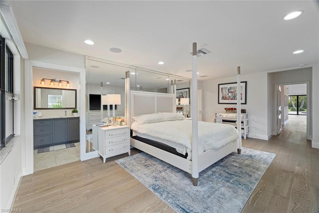 6582 Trail Boulevard Naples, FL 34108 - Photo 42 of 50 a living room with furniture and white walls