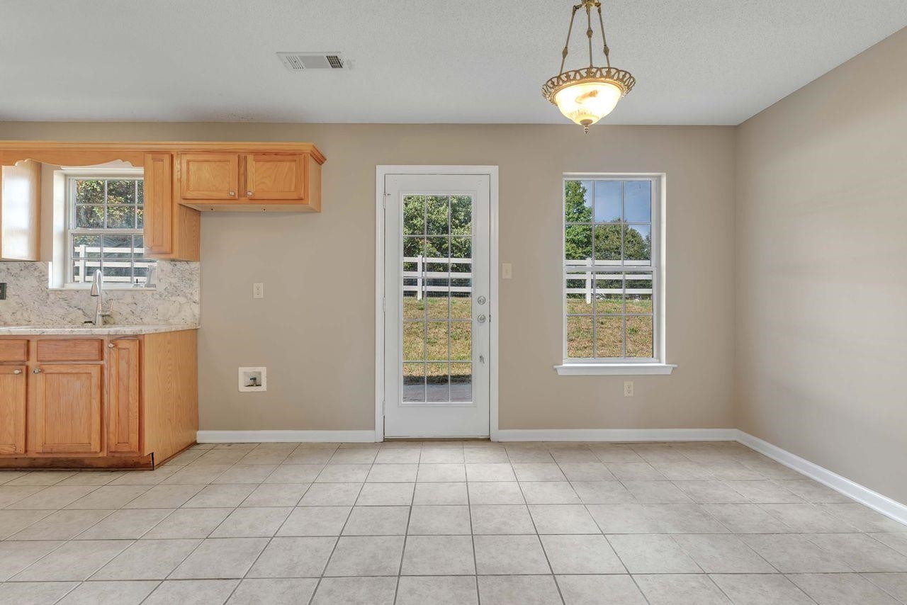 1088 Akins Store Road Munford, TN 38058 - Photo 12 of 40 a view of an empty room with a window