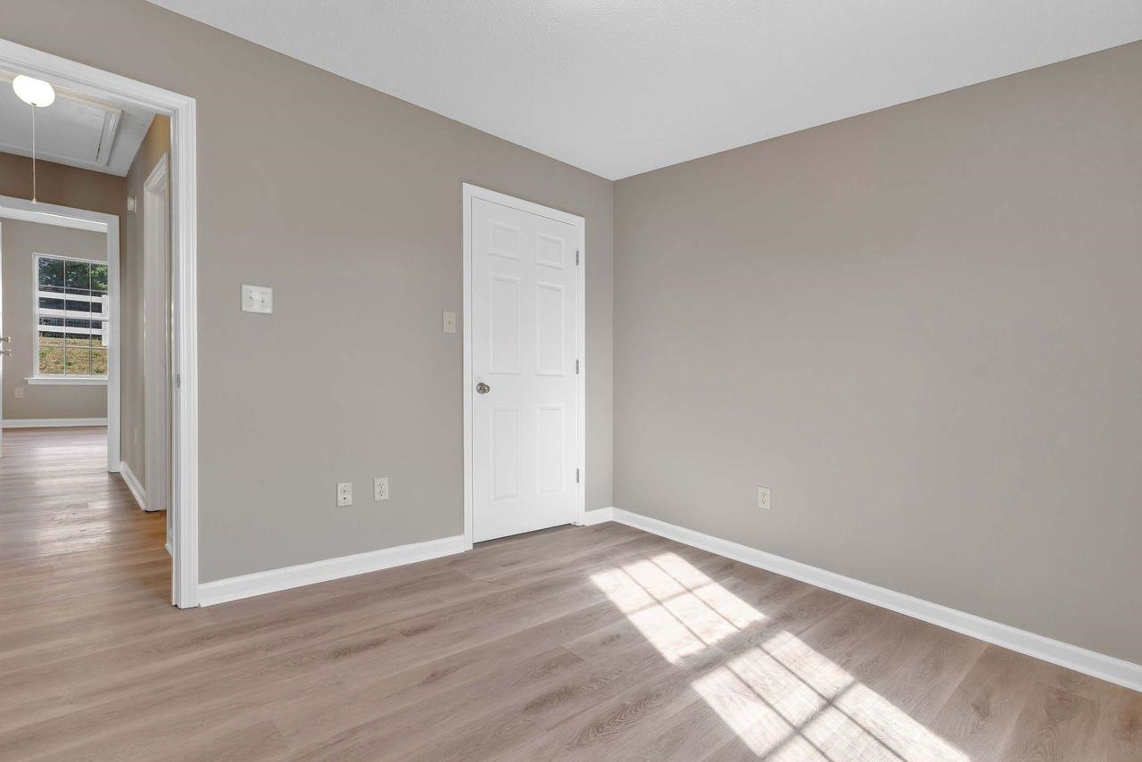 1088 Akins Store Road Munford, TN 38058 - Photo 21 of 40 wooden floor in an empty room