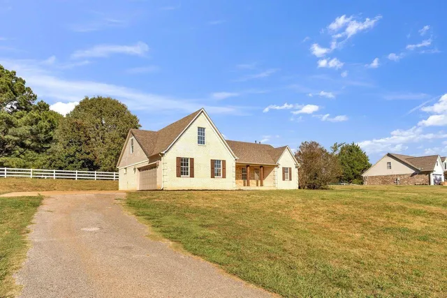 a view of a house with a big yard