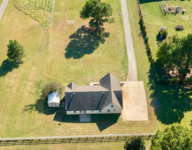 a view of swimming pool with lounge chair