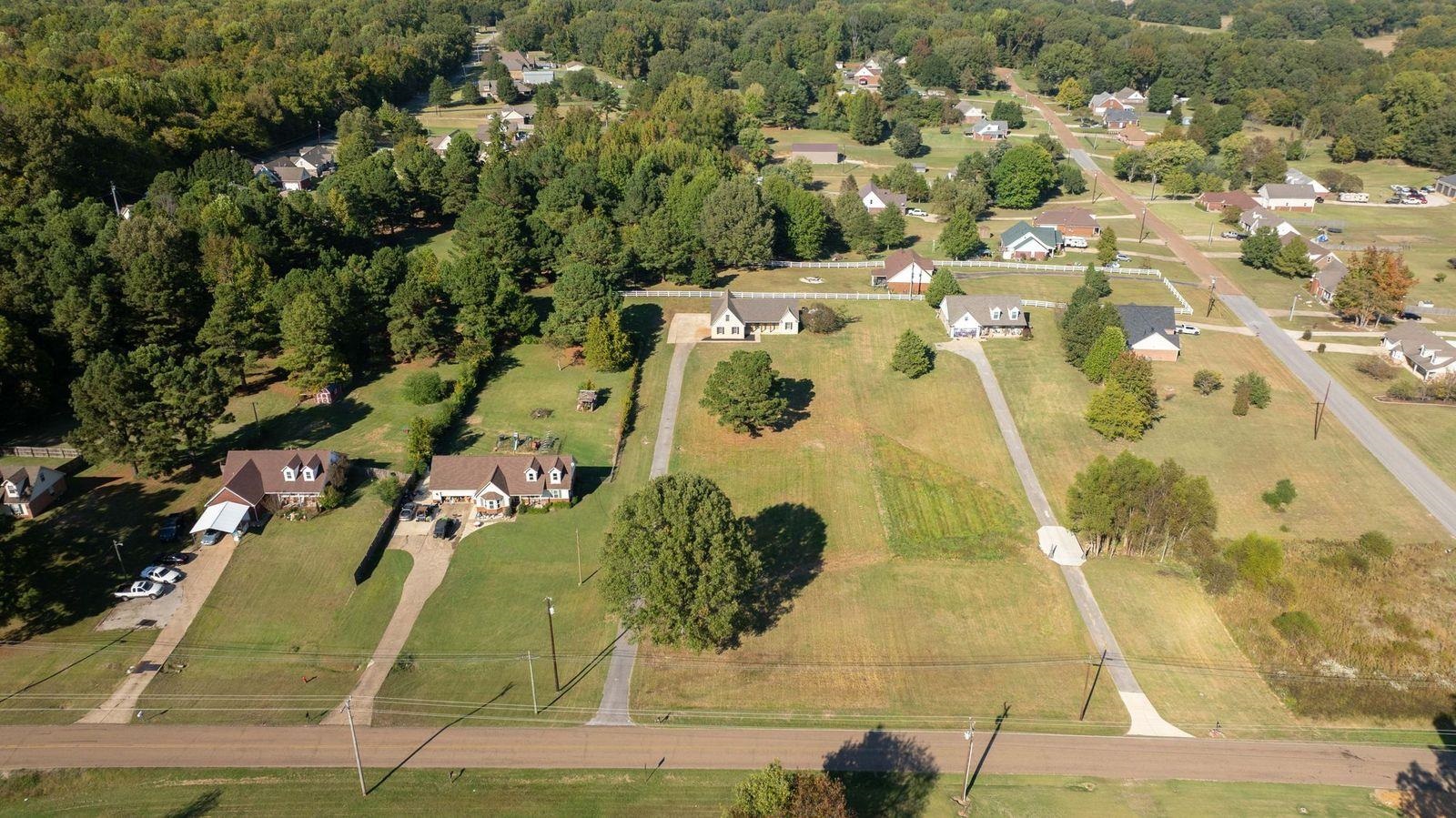 1088 Akins Store Road Munford, TN 38058 - Photo 39 of 40 an aerial view of residential houses with outdoor space
