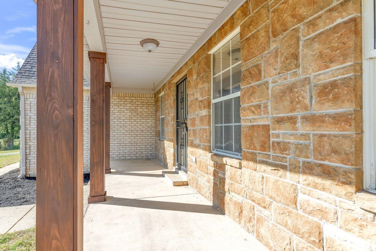 1088 Akins Store Road Munford, TN 38058 - Photo 4 of 40 a view of a door and a window