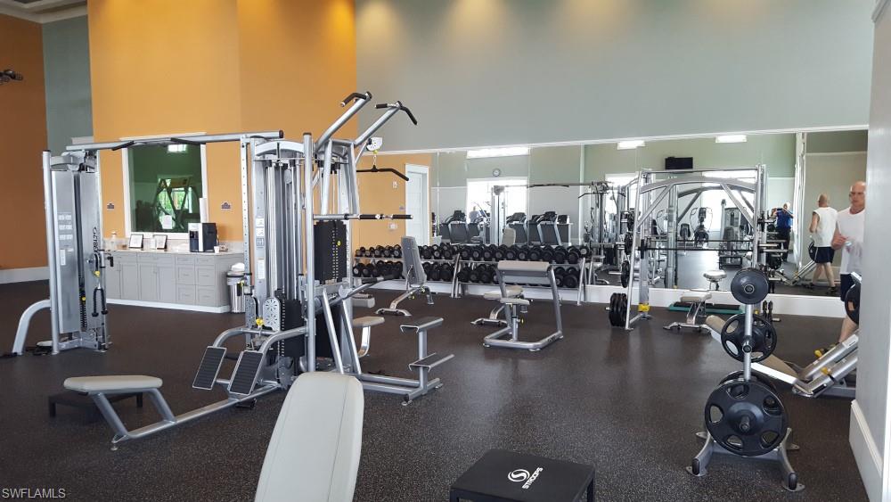 7270 Saona Court Naples, FL 34113 - Photo 28 of 46 a view of a room with gym equipment