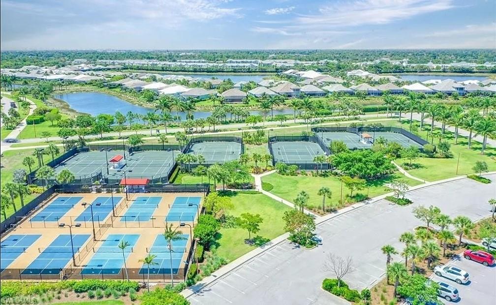 7270 Saona Court Naples, FL 34113 - Photo 31 of 46 an aerial view of residential houses with outdoor space and river