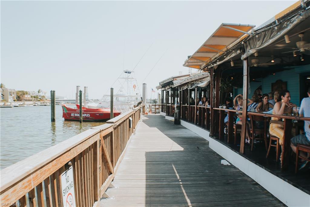 7270 Saona Court Naples, FL 34113 - Photo 38 of 46 a view of city from a balcony