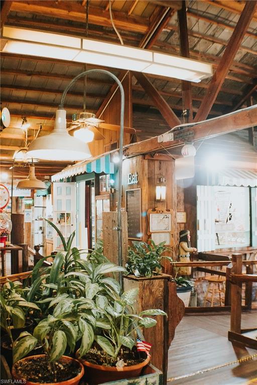 7270 Saona Court Naples, FL 34113 - Photo 40 of 46 a outdoor space with lots of potted plants