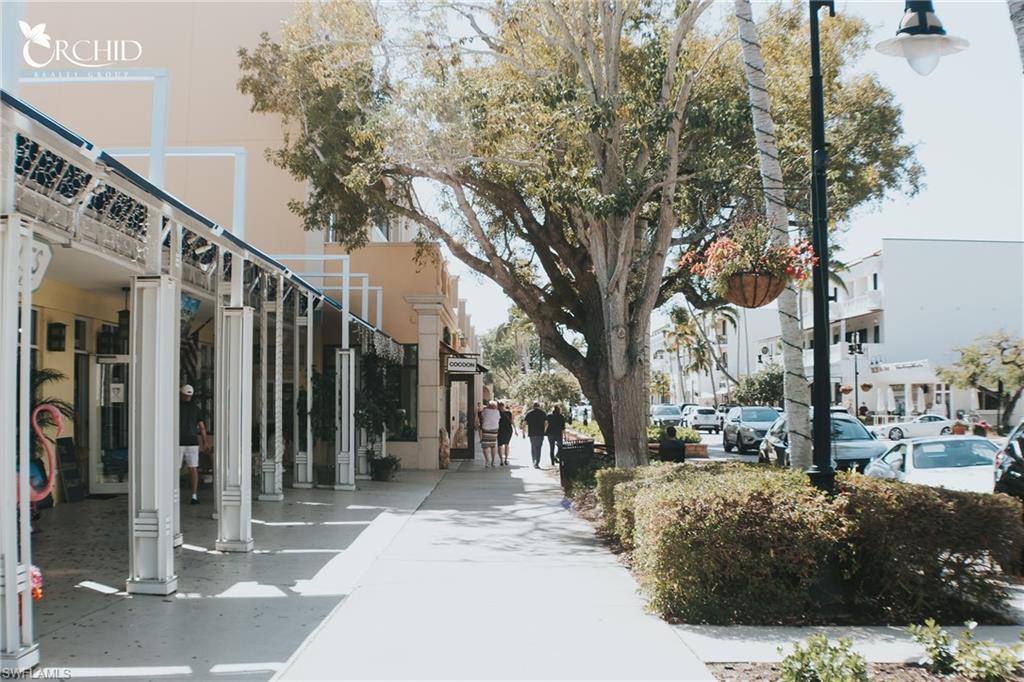 7270 Saona Court Naples, FL 34113 - Photo 46 of 46 a view of street along with building and trees