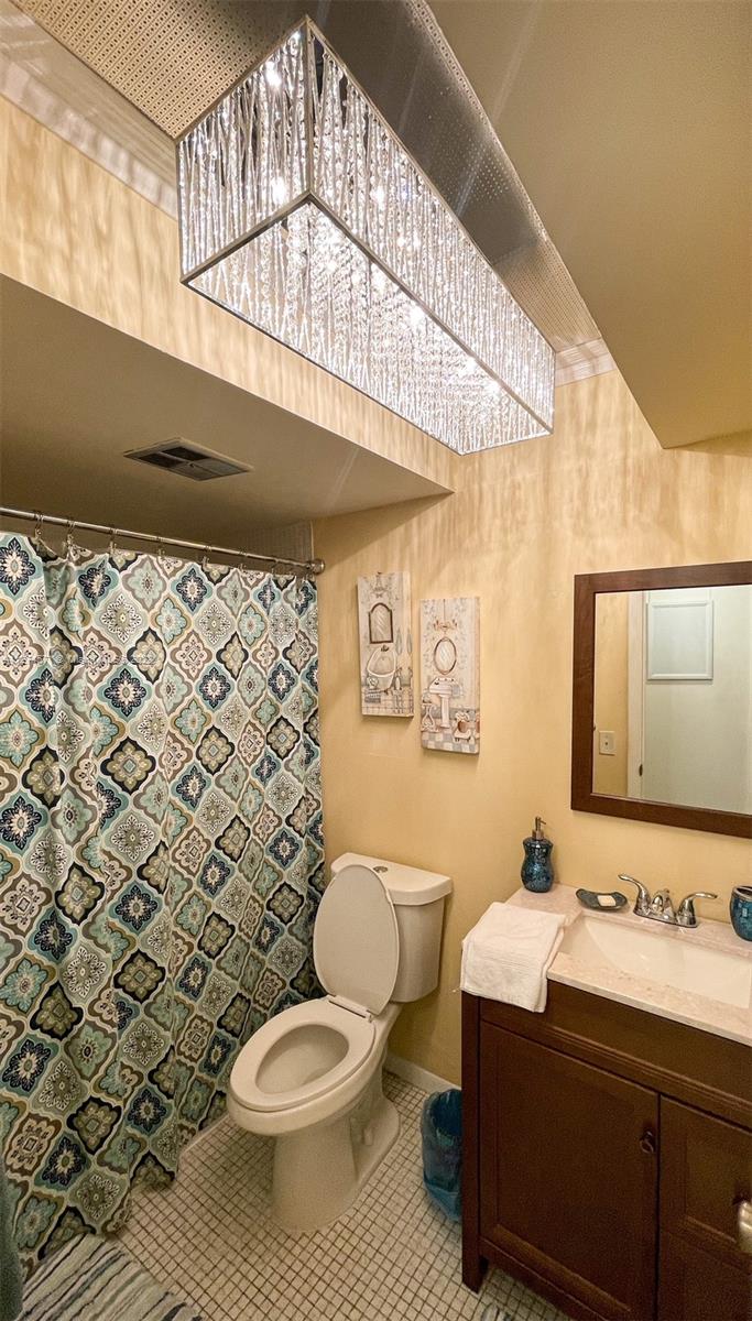 2811 North Pine Island Road, Unit 111 Sunrise, FL 33322 - Photo 9 of 16 a bathroom with a sink toilet and shower