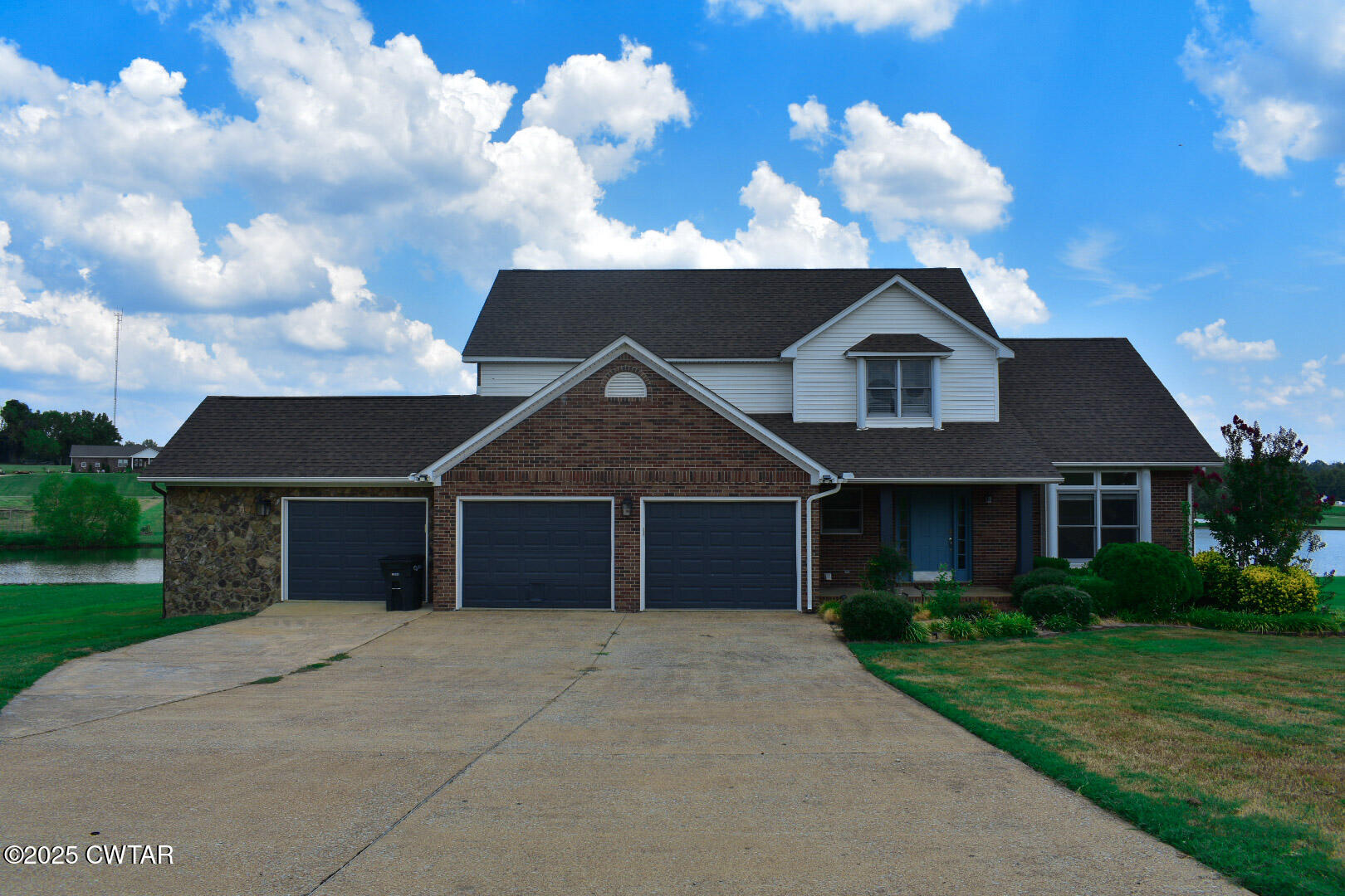 front view of a house with a yard