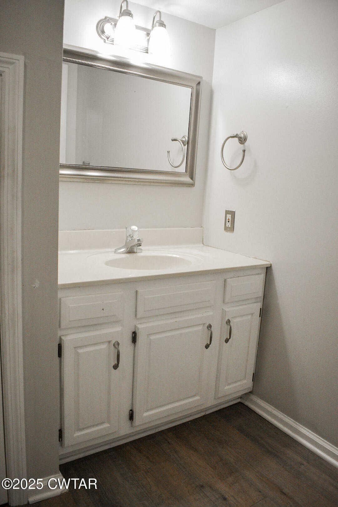 612 Wynridge Troy, TN 38260 - Photo 25 of 42 a bathroom with a sink a mirror and a vanity