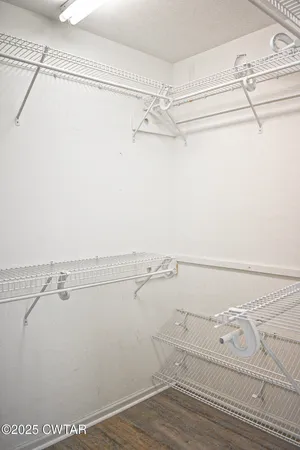 a view of a room with racks on the wall