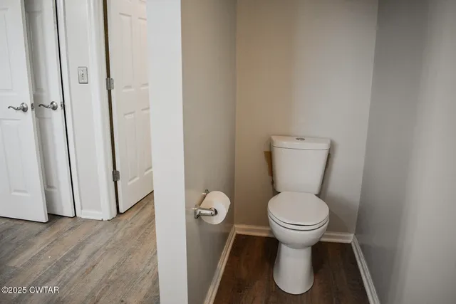 a bathroom with a toilet and a sink