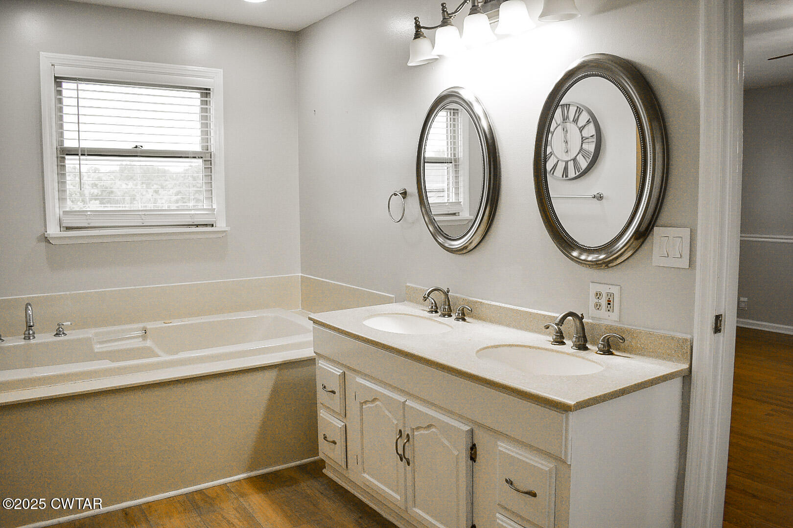 612 Wynridge Troy, TN 38260 - Photo 30 of 42 a bathroom with a sink and a mirror