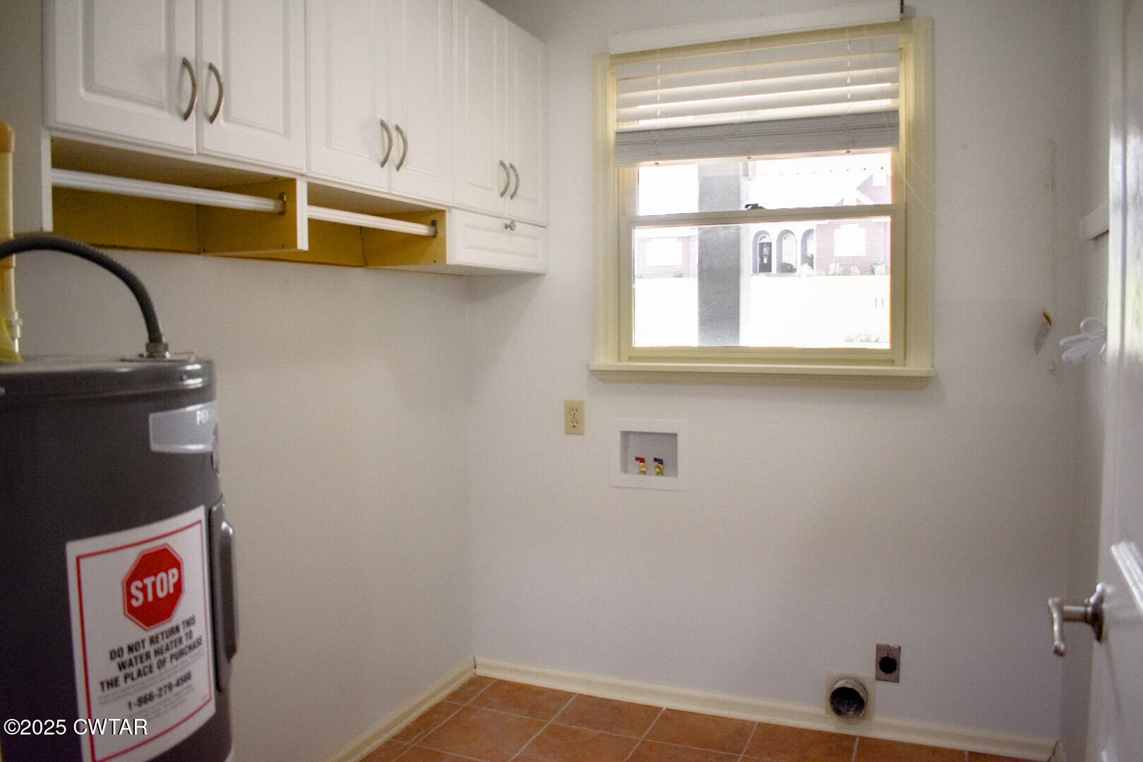612 Wynridge Troy, TN 38260 - Photo 31 of 42 a view of storage and utility room with window