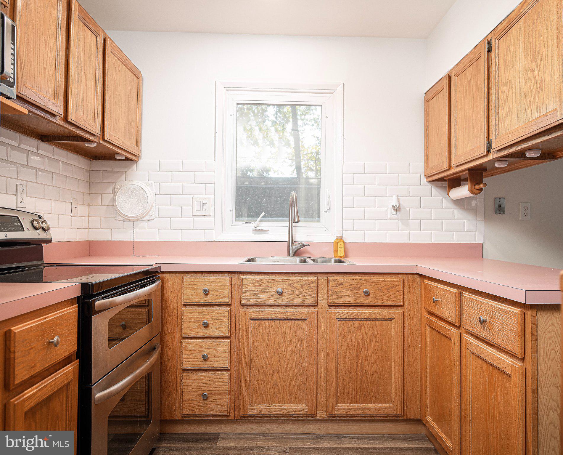 812 Ferguson Road Joppa, MD 21085 - Photo 12 of 41 Lots of cabinets with a subway title backsplash