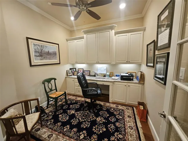 a view of kitchen with workspace and window
