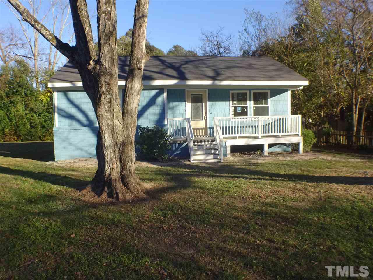 427 Lamont Street Raleigh, NC 27610 - Photo 1 of 13 a front view of a house with a yard