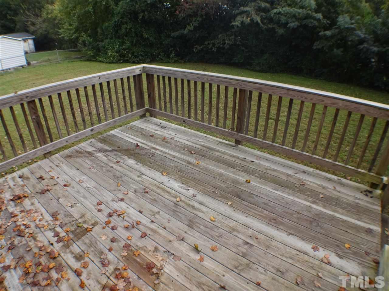 427 Lamont Street Raleigh, NC 27610 - Photo 13 of 13 a view of balcony with wooden floor