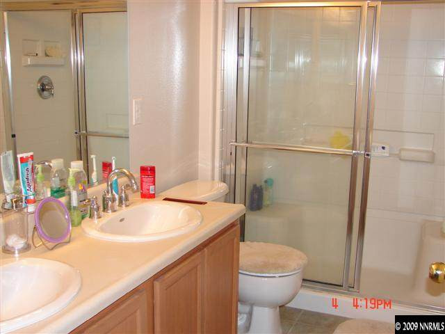 2904 Bryan Street Reno, NV 89503 - Photo 4 of 8 a bathroom with a sink toilet and shower
