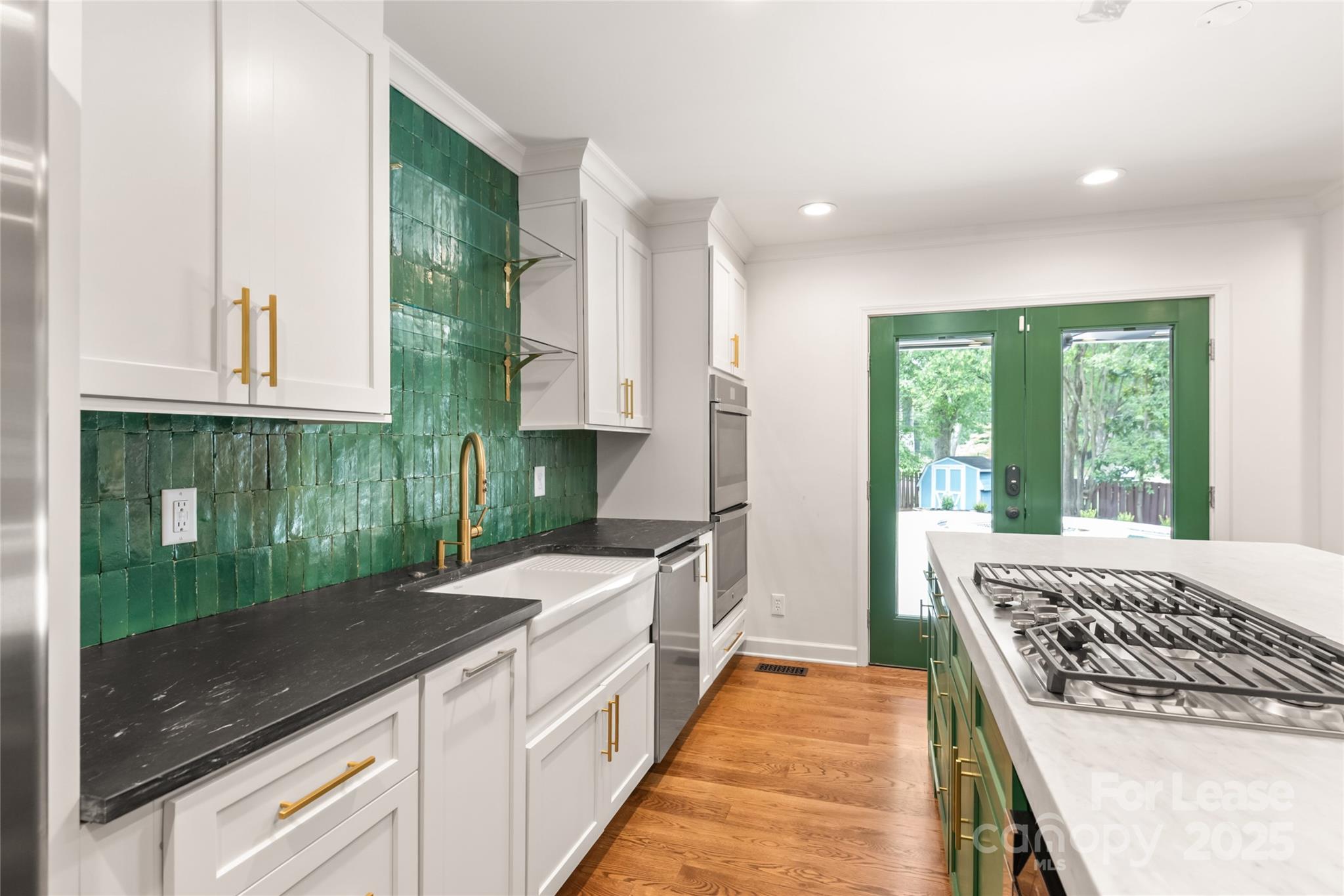 3726 Providence Road Charlotte, NC 28211 - Photo 14 of 45 a spacious bathroom with a granite countertop sink and a window
