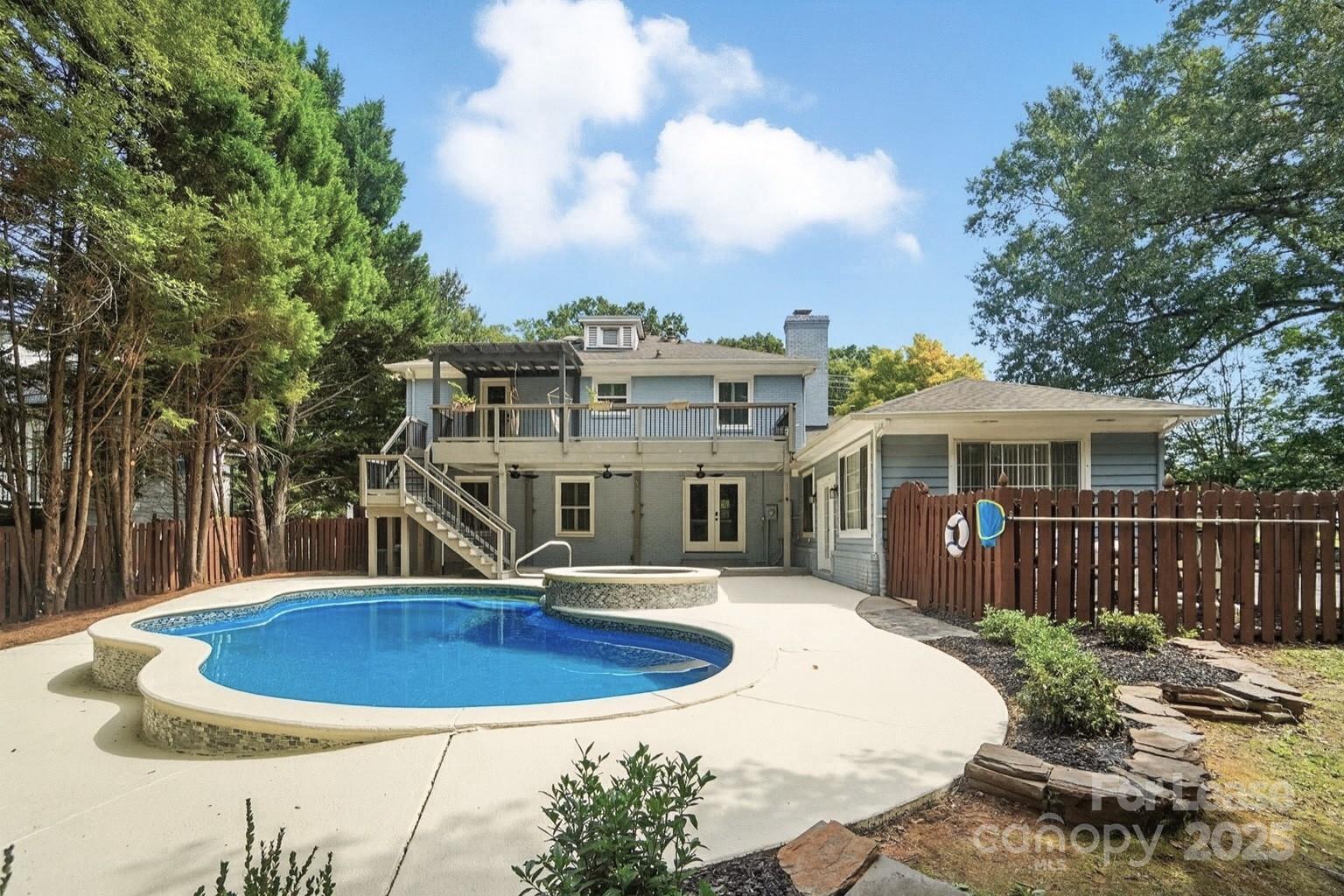 3726 Providence Road Charlotte, NC 28211 - Photo 36 of 45 a view of a house with a swimming pool