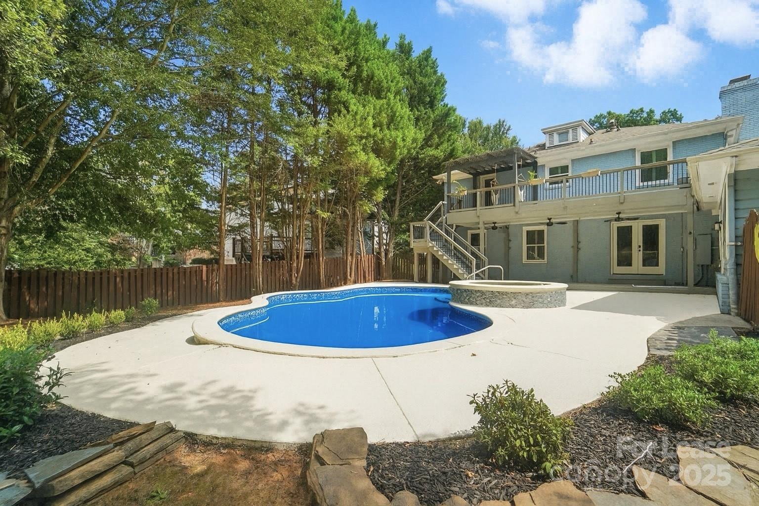 3726 Providence Road Charlotte, NC 28211 - Photo 37 of 45 a swimming pool with outdoor seating and yard