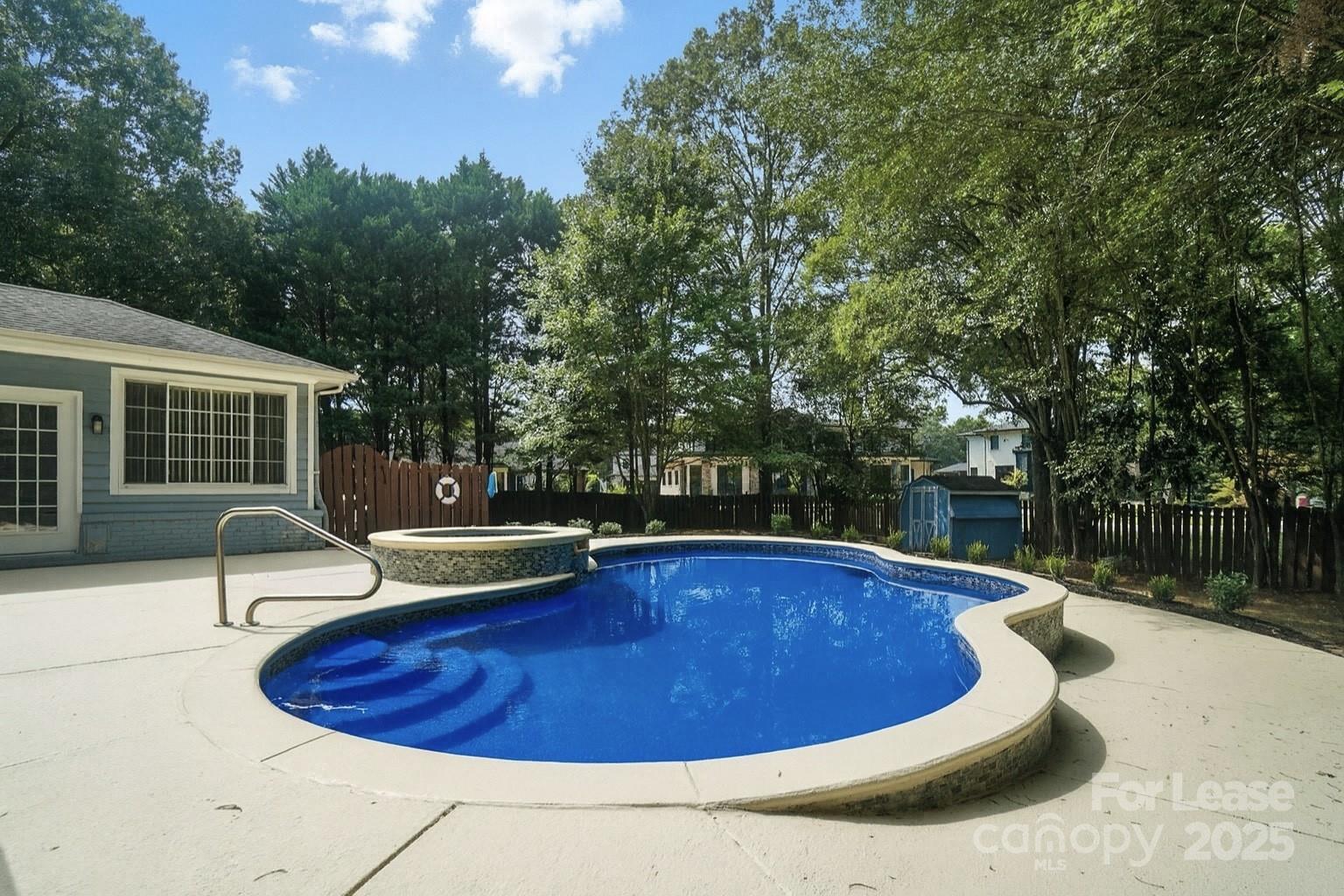 3726 Providence Road Charlotte, NC 28211 - Photo 39 of 45 a view of a swimming pool with back yard