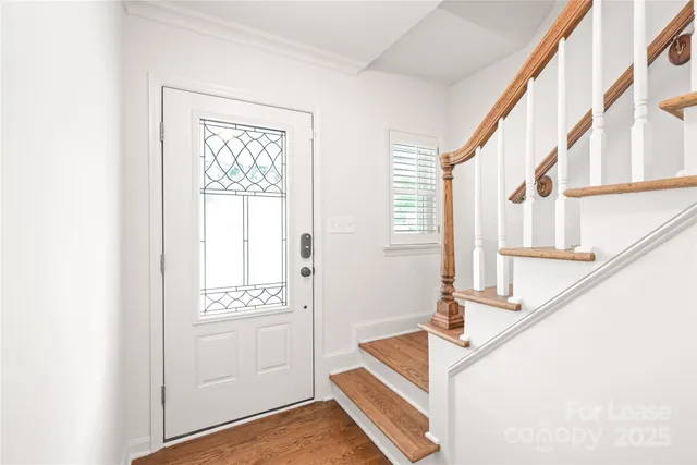 a view of front door with stairs