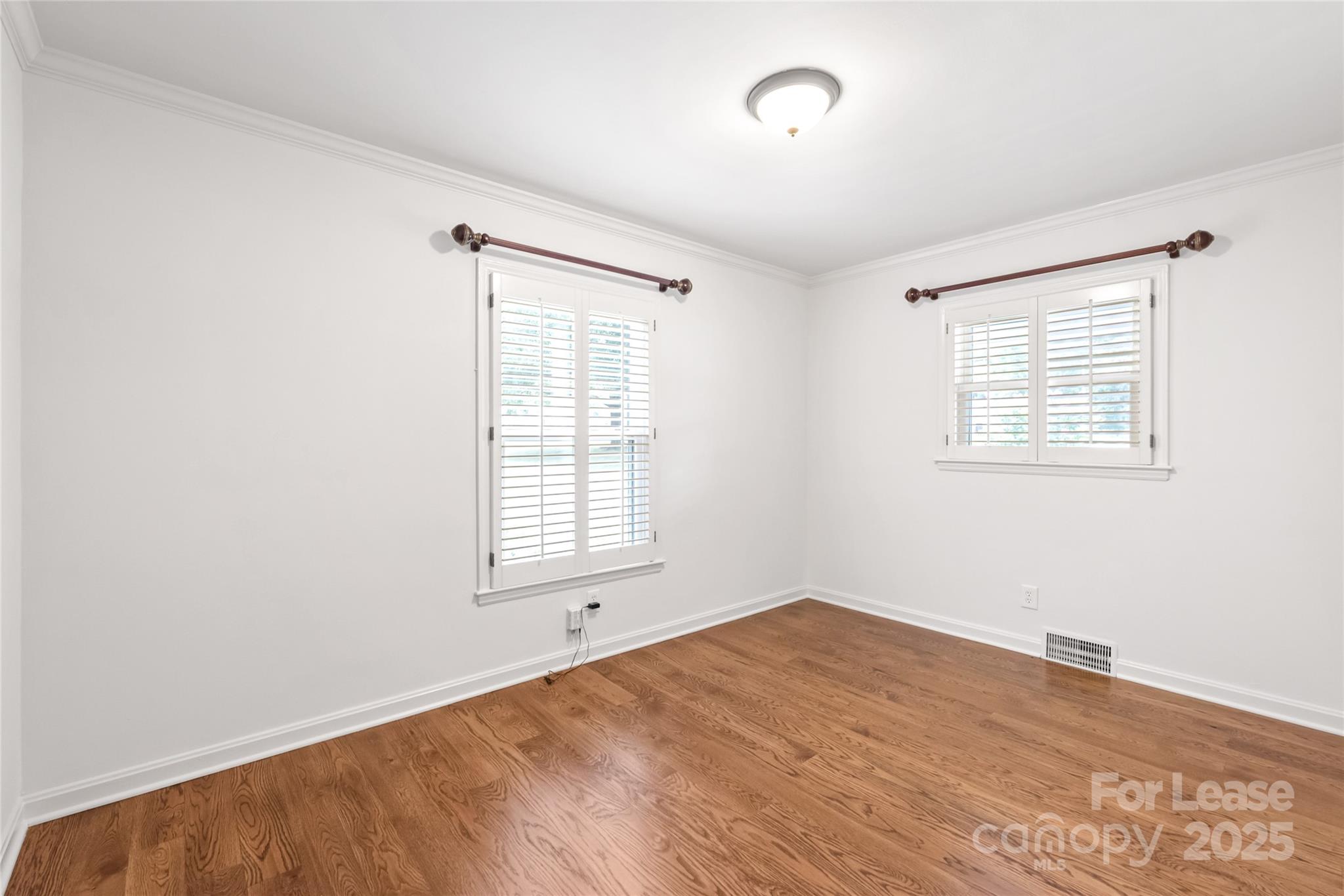 3726 Providence Road Charlotte, NC 28211 - Photo 5 of 45 an empty room with a window