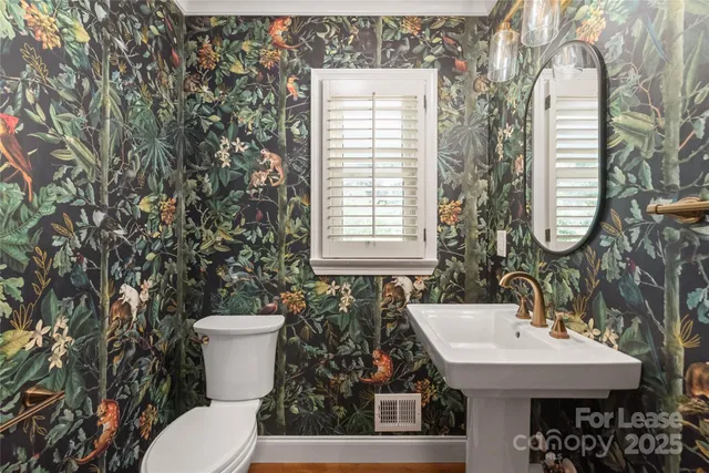 a bathroom with a sink and a toilet