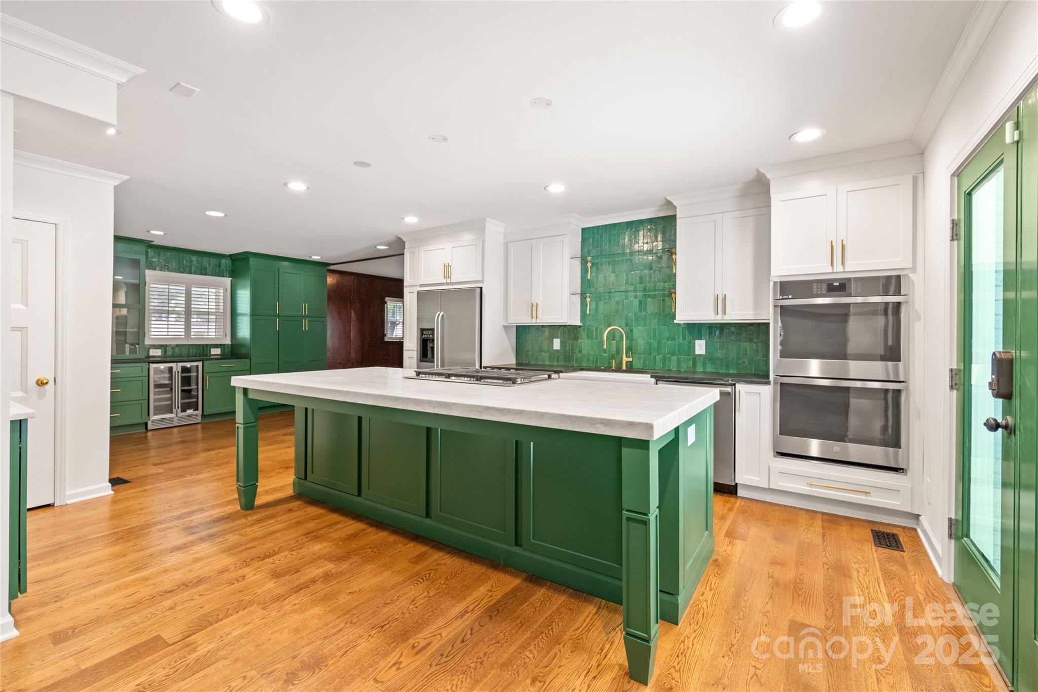 3726 Providence Road Charlotte, NC 28211 - Photo 10 of 45 a kitchen with stainless steel appliances granite countertop a sink and a refrigerator