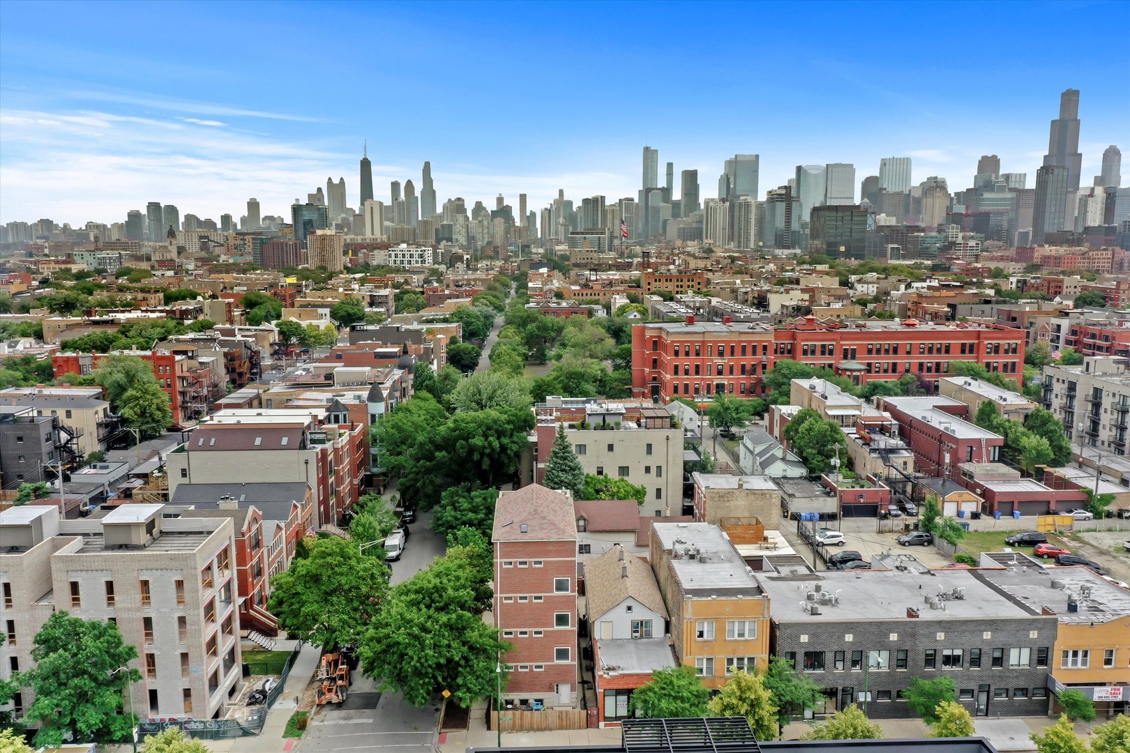 1535 West Ohio Street, Unit 2 Chicago, IL 60642 - Photo 24 of 25 an aerial view of a city with lots of residential buildings
