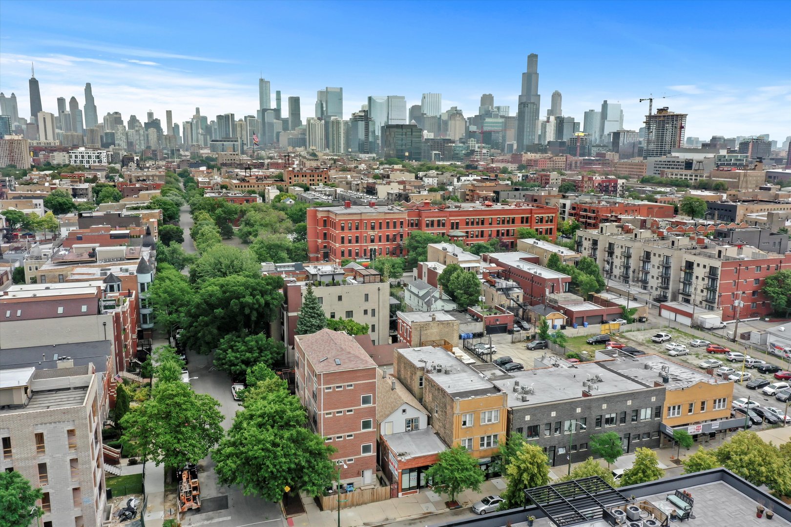 1535 West Ohio Street, Unit 2 Chicago, IL 60642 - Photo 3 of 25 a view of a city with tall buildings