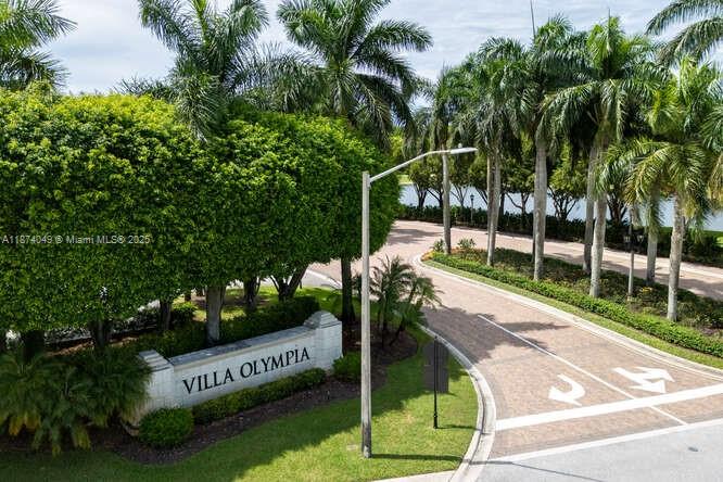 9770 Scribner Lane Wellington, FL 33414 - Photo 27 of 43 a view of a park with plants and palm trees