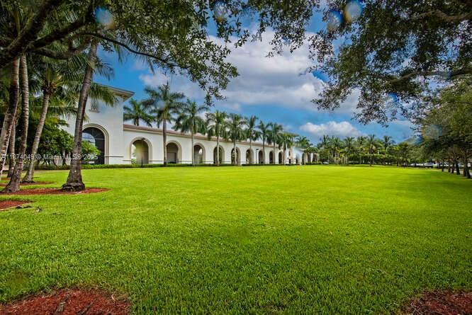 9770 Scribner Lane Wellington, FL 33414 - Photo 28 of 43 a view of a house with a big yard