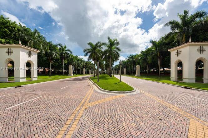9770 Scribner Lane Wellington, FL 33414 - Photo 29 of 43 a view of a white house with a yard