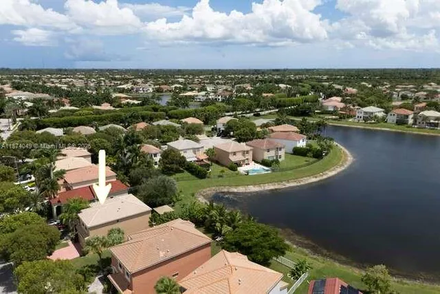 an aerial view of a house with a garden