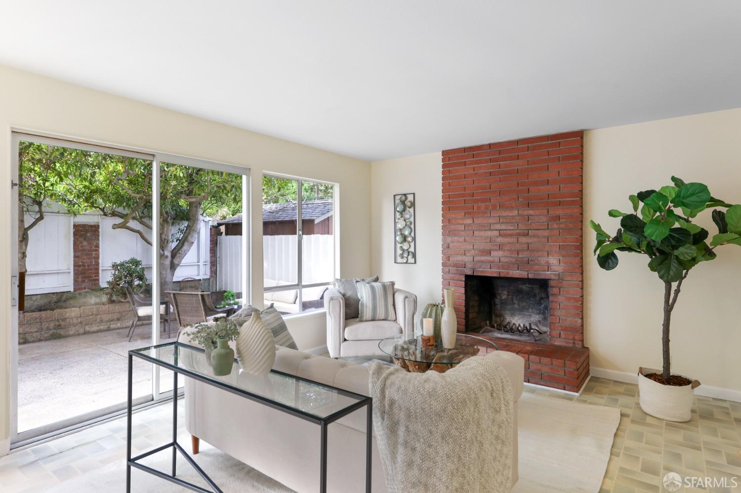 20 Point Reyes Way Pacifica, CA 94044 - Photo 15 of 78 a living room with furniture potted plant and a fireplace