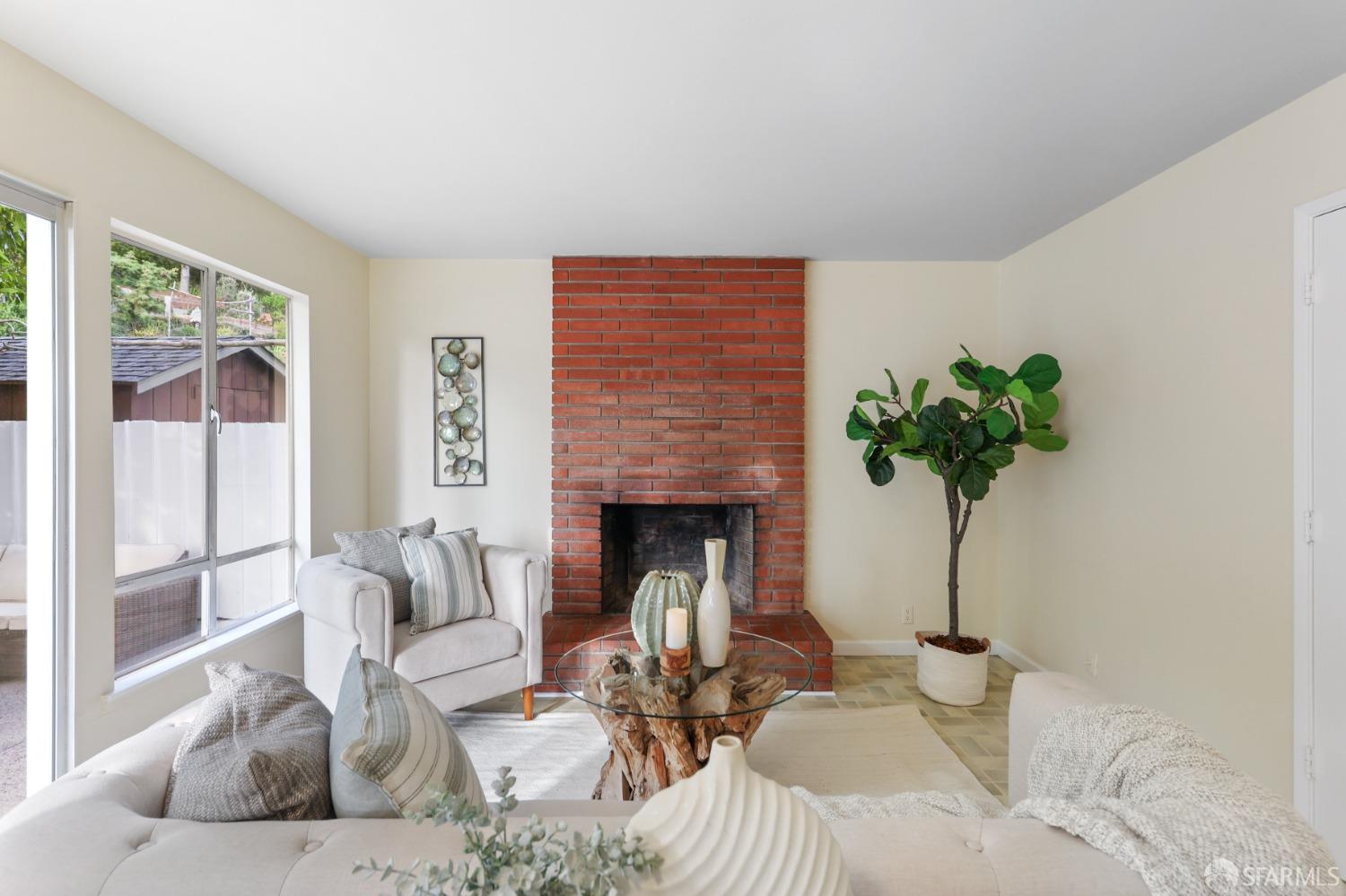 20 Point Reyes Way Pacifica, CA 94044 - Photo 16 of 78 a living room with furniture and a fireplace