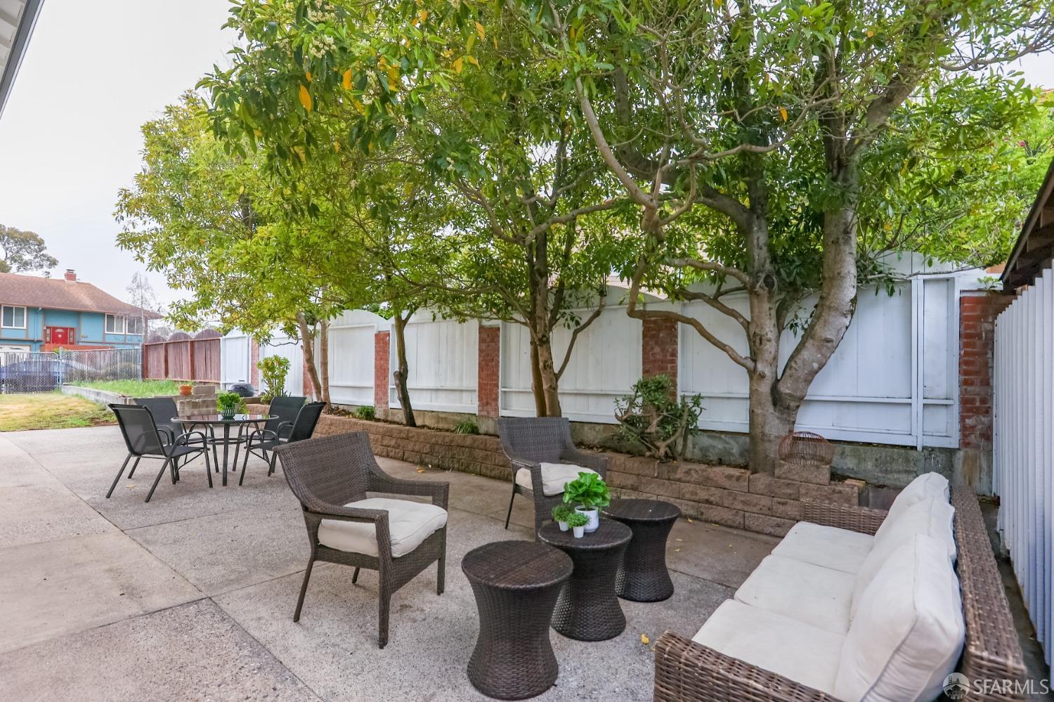 20 Point Reyes Way Pacifica, CA 94044 - Photo 46 of 78 a view of a patio with couches and a table and chairs with plants and a barbeque