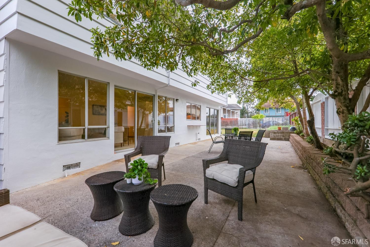 20 Point Reyes Way Pacifica, CA 94044 - Photo 47 of 78 a view of a patio with couches and potted plants